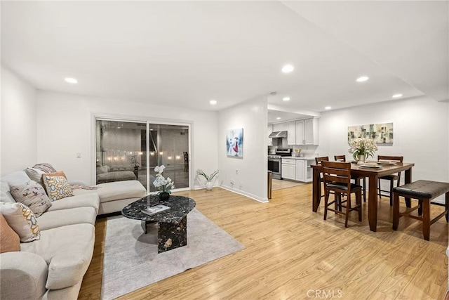 1696 Shady Brook Dr Unit 14, Fullerton, CA 92831 - living room with light wood finished floors and recessed lighting