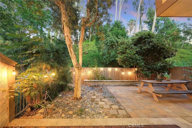 1696 Shady Brook Dr Unit 14, Fullerton, CA 92831 - fenced backyard featuring a patio and outdoor dining space
