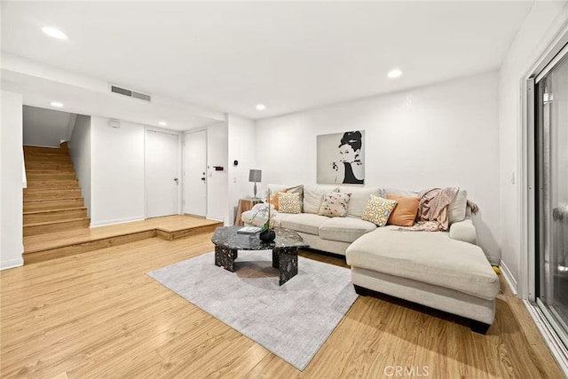 1696 Shady Brook Dr Unit 14, Fullerton, CA 92831 - living area with recessed lighting, stairs, and wood finished floors