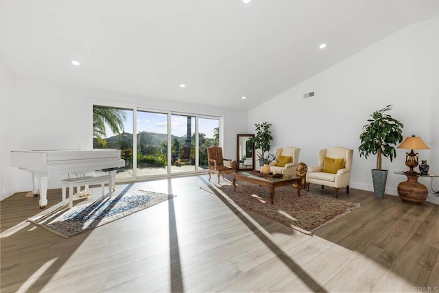 2027 Jenna Pl, Escondido, CA 92029 - living area with light wood-type flooring, recessed lighting, and vaulted ceiling