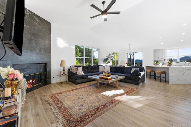 2027 Jenna Pl, Escondido, CA 92029 - living room with plenty of natural light, a fireplace, recessed lighting, ceiling fan, and wood finished floors