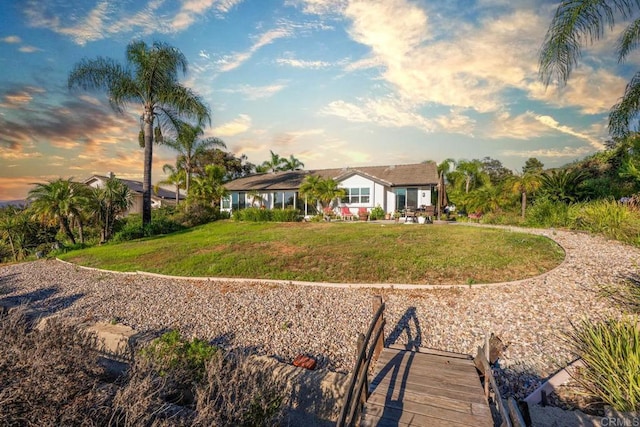 2027 Jenna Pl, Escondido, CA 92029 - back of property at dusk featuring a lawn