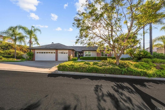 2027 Jenna Pl, Escondido, CA 92029 - single story home with an attached garage, driveway, and brick siding