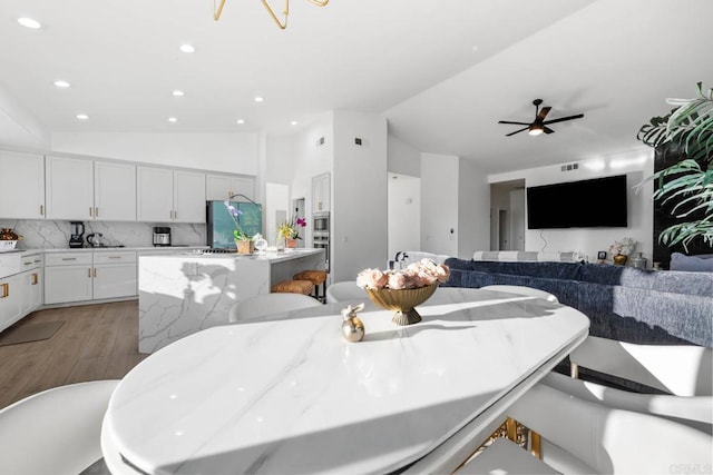 2027 Jenna Pl, Escondido, CA 92029 - dining room with vaulted ceiling, light wood-style flooring, recessed lighting, and ceiling fan