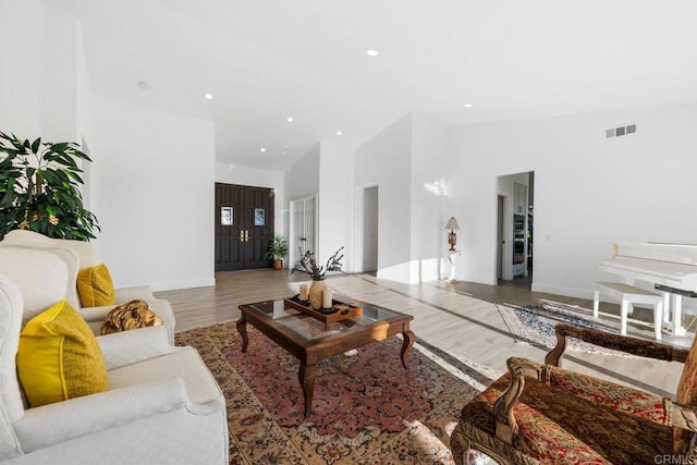 2027 Jenna Pl, Escondido, CA 92029 - living area with high vaulted ceiling, wood finished floors, and recessed lighting