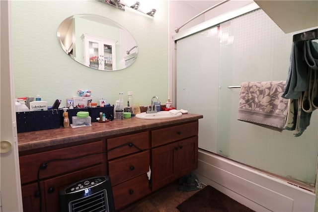 13135 Sunnybrook Cir Unit 205, Garden Grove, CA 92844 - full bath with vanity, combined bath / shower with glass door, and wood finished floors