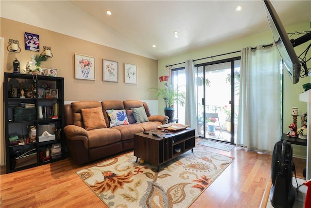 13135 Sunnybrook Cir Unit 205, Garden Grove, CA 92844 - living room with wood finished floors, lofted ceiling, and recessed lighting