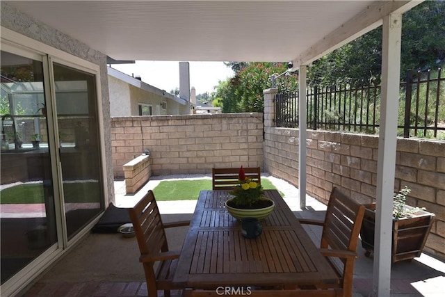 20611 Alaminos Dr, Saugus, CA 91350 - fenced backyard featuring a patio area and outdoor dining space
