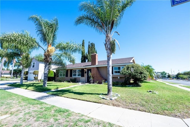3730 E Euclid Ave, Orange, CA 92869 - ranch-style house with a chimney and a front yard
