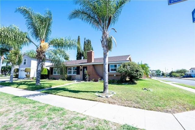 3730 E Euclid Ave, Orange, CA 92869 - single story home featuring a chimney and a front yard