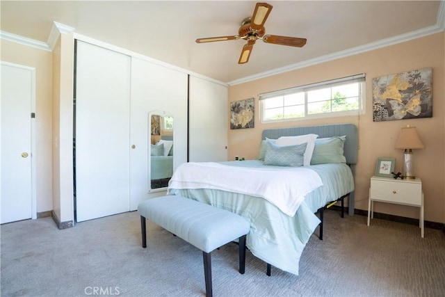3730 E Euclid Ave, Orange, CA 92869 - carpeted bedroom with ornamental molding, a closet, and ceiling fan