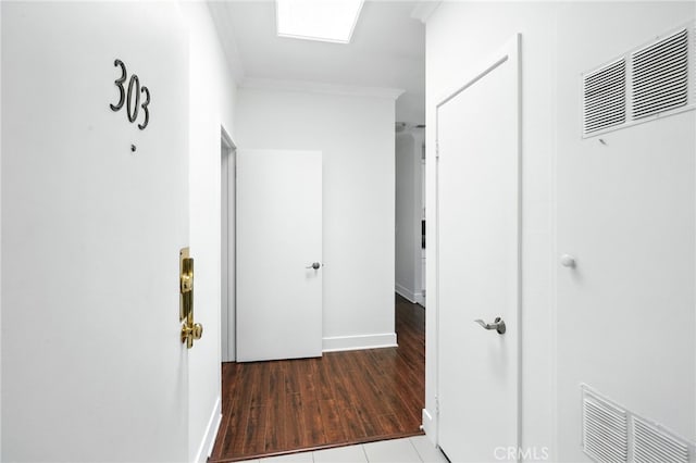12001 Goshen Ave Unit 303, Los Angeles, CA 90049 - hallway with ornamental molding and wood finished floors
