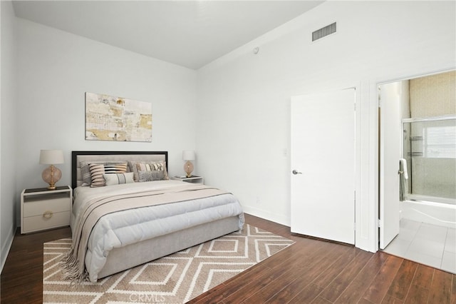 12001 Goshen Ave Unit 303, Los Angeles, CA 90049 - bedroom featuring wood finished floors and connected bathroom