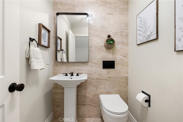 2666 Peacock Pl, La Verne, CA 91750 - bathroom featuring a sink and tile walls