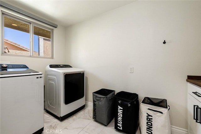 2666 Peacock Pl, La Verne, CA 91750 - laundry area with washer and clothes dryer and light marble finish floors