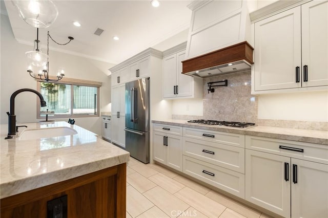 2666 Peacock Pl, La Verne, CA 91750 - kitchen with appliances with stainless steel finishes, tasteful backsplash, decorative light fixtures, light tile patterned floors, and crown molding
