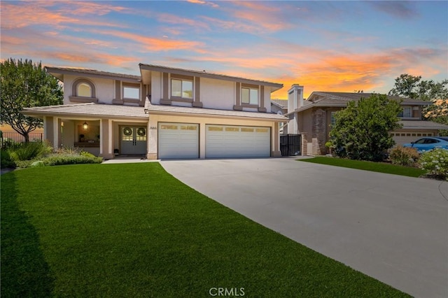 2666 Peacock Pl, La Verne, CA 91750 - traditional-style home featuring a garage, concrete driveway, stucco siding, and covered porch