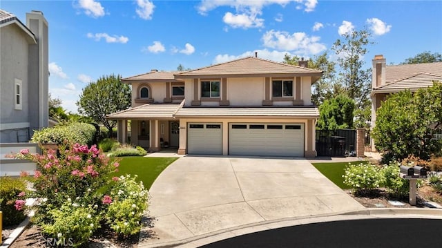 2666 Peacock Pl, La Verne, CA 91750 - view of front of home with an attached garage, concrete driveway, and stucco siding