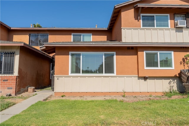 41 Scottsdale S, Carson, CA 90745 - view of front facade with a front yard and stucco siding
