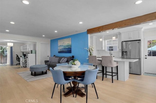 5535 W 142nd Pl, Hawthorne, CA 90250 - dining space with light wood finished floors, recessed lighting, and crown molding