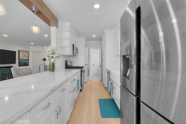 5535 W 142nd Pl, Hawthorne, CA 90250 - kitchen with stainless steel appliances, white cabinetry, light wood-style flooring, tasteful backsplash, and open shelves