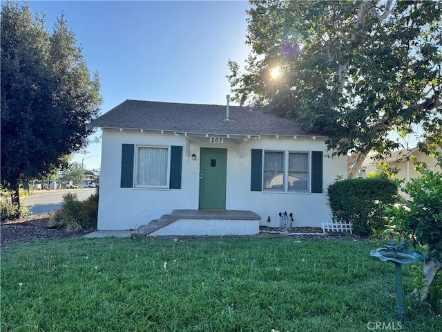 267 Olive St, Claremont, CA 91711 - bungalow-style house featuring a front lawn, a shingled roof, and stucco siding