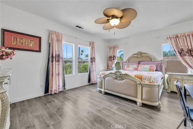 2925 Lemon St, Riverside, CA 92501 - bedroom featuring wood finished floors and ceiling fan