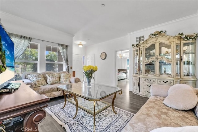 2925 Lemon St, Riverside, CA 92501 - living room featuring crown molding, dark wood finished floors, and a chandelier