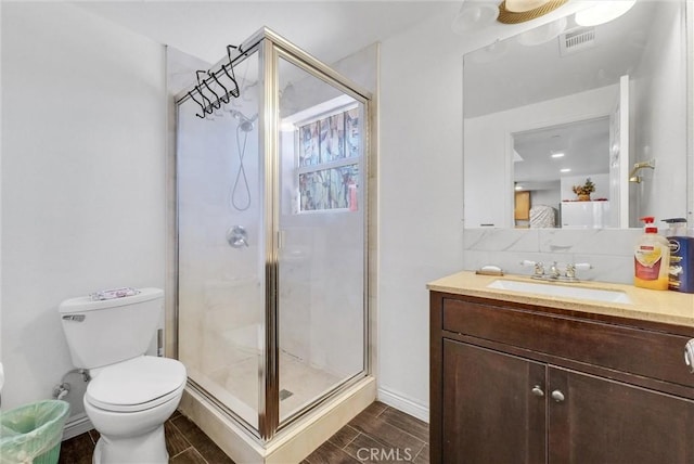 2925 Lemon St, Riverside, CA 92501 - full bathroom with a shower stall, vanity, and wood tiled floors