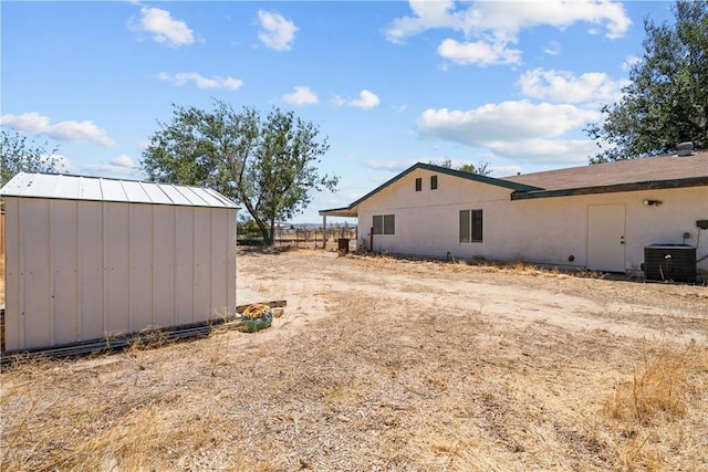 8558 W W Ave E8, Lancaster, CA 93536 - view of yard featuring a storage unit