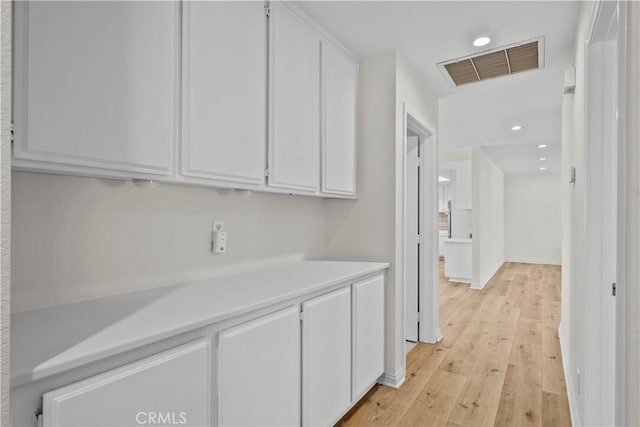 8558 W W Ave E8, Lancaster, CA 93536 - corridor featuring light wood-type flooring and recessed lighting