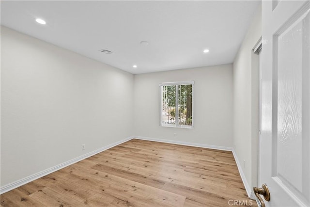 8558 W W Ave E8, Lancaster, CA 93536 - unfurnished room with light wood-style floors and recessed lighting