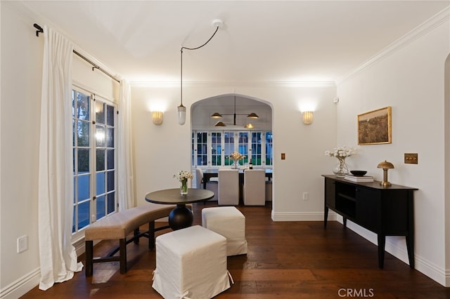 4730 Angeles Vista Blvd, View Park, CA 90043 - dining space featuring arched walkways, ornamental molding, and wood finished floors