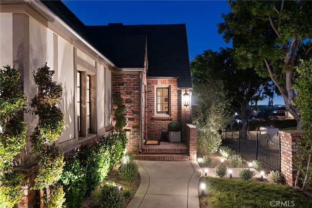 4730 Angeles Vista Blvd, View Park, CA 90043 - exterior entry at night featuring brick siding