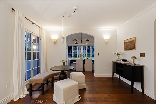 4730 Angeles Vista Blvd, View Park, CA 90043 - dining area with arched walkways, crown molding, and wood finished floors