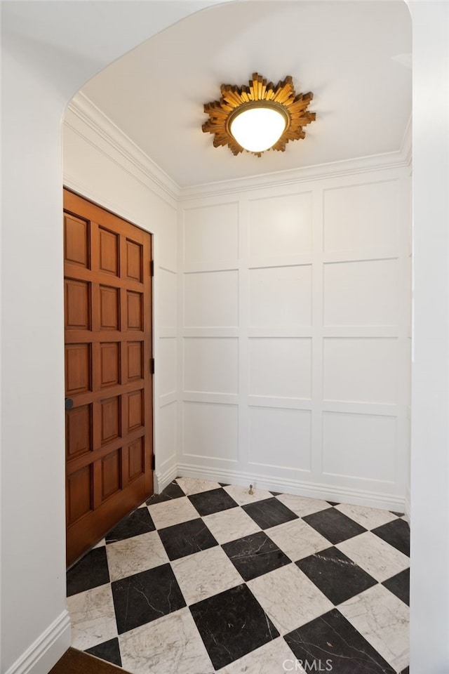 4730 Angeles Vista Blvd, View Park, CA 90043 - foyer entrance with a decorative wall, arched walkways, and crown molding