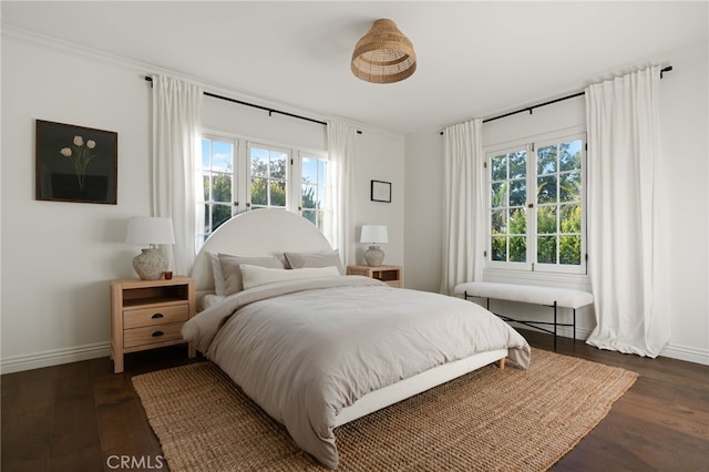 4730 Angeles Vista Blvd, View Park, CA 90043 - bedroom featuring dark wood-style floors and baseboards
