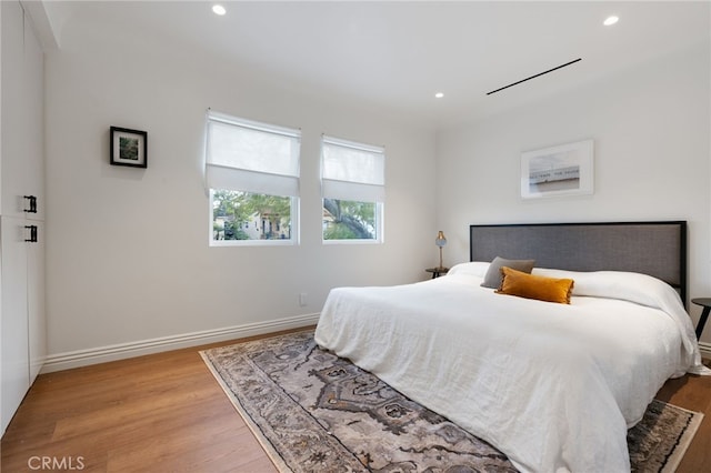 4730 Angeles Vista Blvd, View Park, CA 90043 - bedroom with light wood-style flooring and recessed lighting