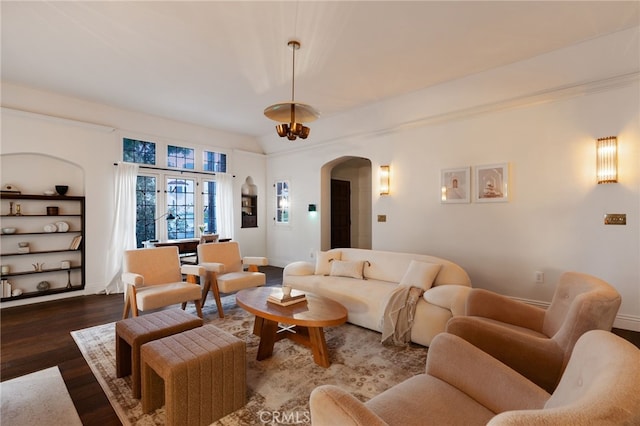 4730 Angeles Vista Blvd, View Park, CA 90043 - living area featuring arched walkways and wood finished floors