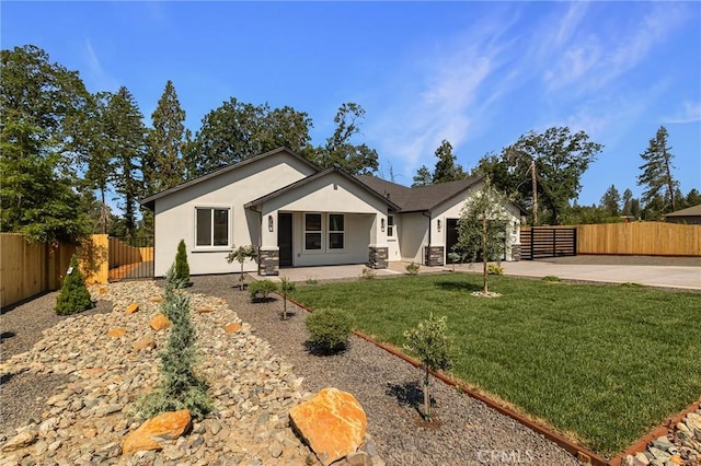 5909 Del Mar Ave, Paradise, CA 95969 - view of front of property with concrete driveway, stucco siding, a garage, and stone siding