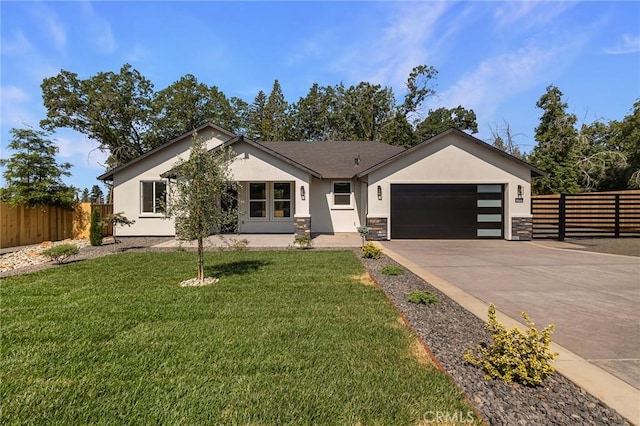 5909 Del Mar Ave, Paradise, CA 95969 - view of front of property featuring stucco siding, an attached garage, concrete driveway, and stone siding