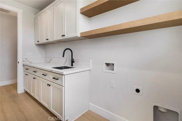 5909 Del Mar Ave, Paradise, CA 95969 - laundry room with electric dryer hookup, cabinet space, washer hookup, and light wood finished floors