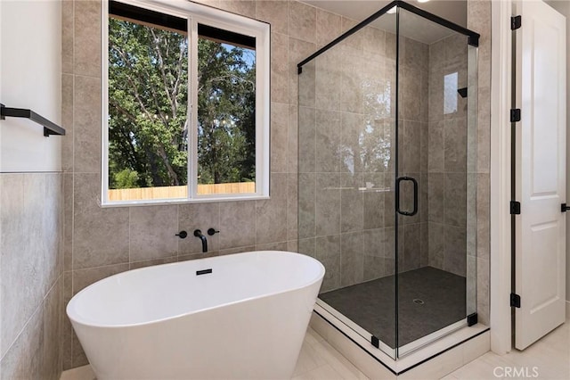 5909 Del Mar Ave, Paradise, CA 95969 - full bath with a freestanding bath, a shower stall, and tile walls