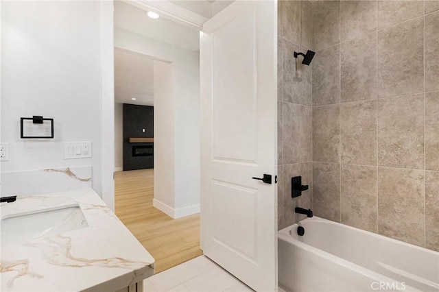 5909 Del Mar Ave, Paradise, CA 95969 - bathroom with  shower combination, vanity, and wood finished floors