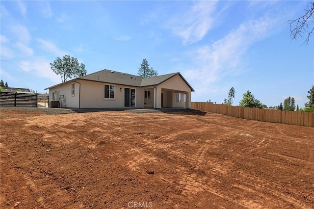 5909 Del Mar Ave, Paradise, CA 95969 - back of house with stucco siding and a patio area