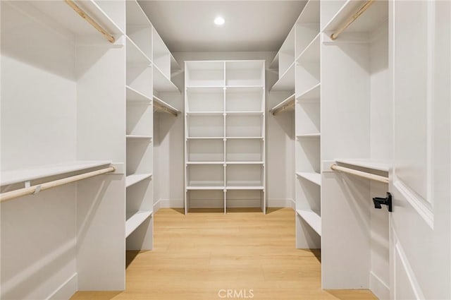 5909 Del Mar Ave, Paradise, CA 95969 - walk in closet with light wood-style floors