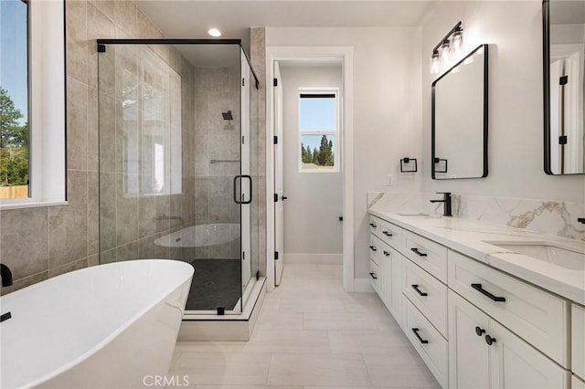 5909 Del Mar Ave, Paradise, CA 95969 - bathroom with a freestanding bath, double vanity, a shower stall, and recessed lighting