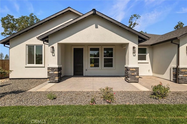 5909 Del Mar Ave, Paradise, CA 95969 - rear view of property featuring stucco siding, stone siding, and a patio