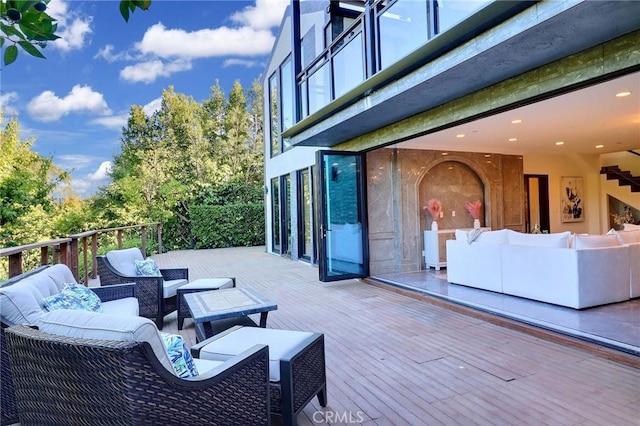182 Denslow Ave, Los Angeles, CA 90049 - wooden deck with an outdoor living space