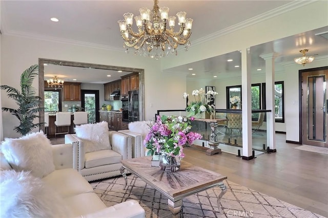 182 Denslow Ave, Los Angeles, CA 90049 - living area with a chandelier, light wood-style flooring, recessed lighting, and ornamental molding